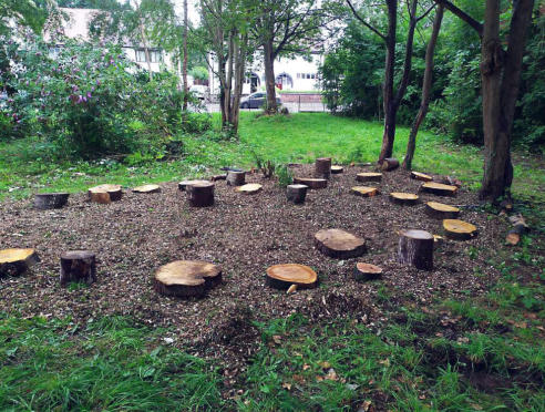 rock street community woodland in salford logs and woodchip